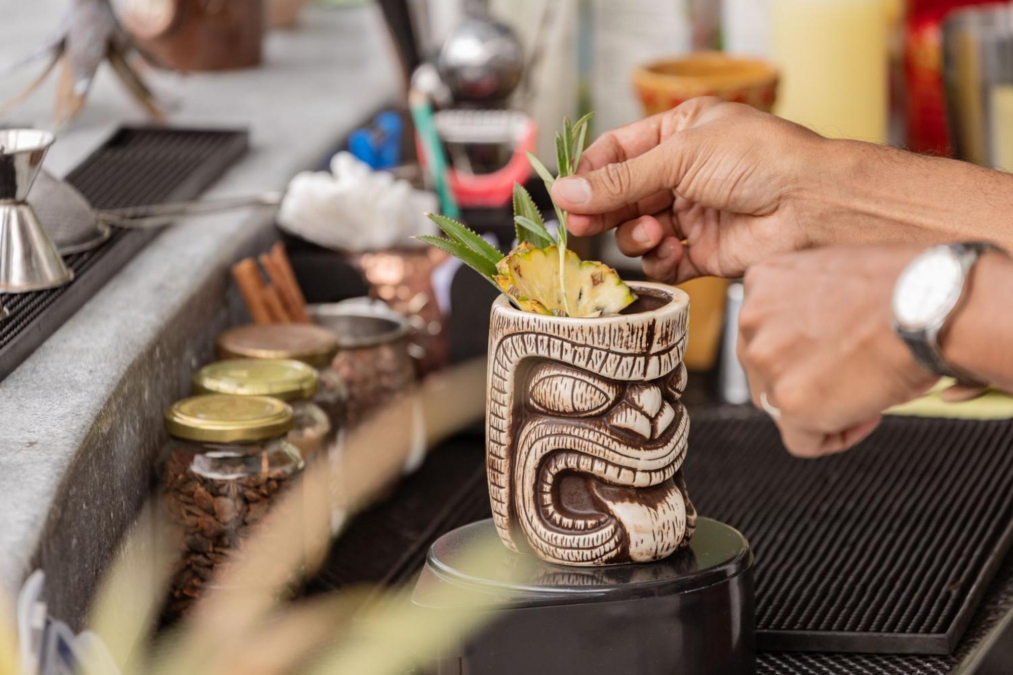 Skyview Resort Phuket Patong Beach Ngoại thất bức ảnh A tiki drink being garnished